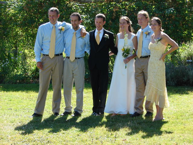 The bridal party poses for pictures.