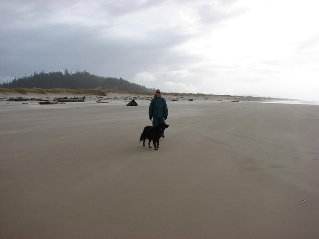 Lindsay and Ellie walk along the beach.  