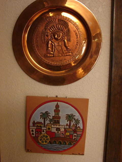 I bought the plate in Mexico and the square may have been a gift from Spain.
