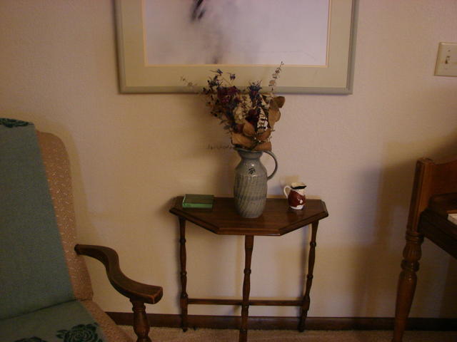 The table was from Pam Story in college.  I refinished it.  The vase was bought in an auction at church.  The little vase was my