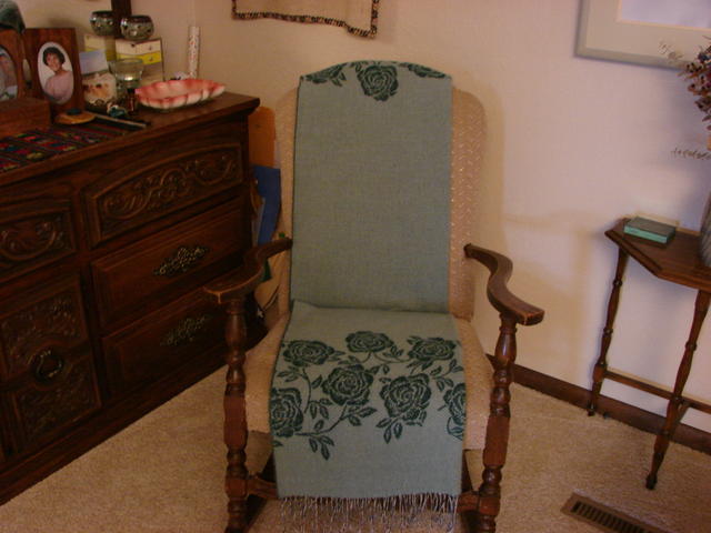 I bought the throw for my mom.  The rocking chair was old when I had it in my room as a teenager.  My parents had it reupholster