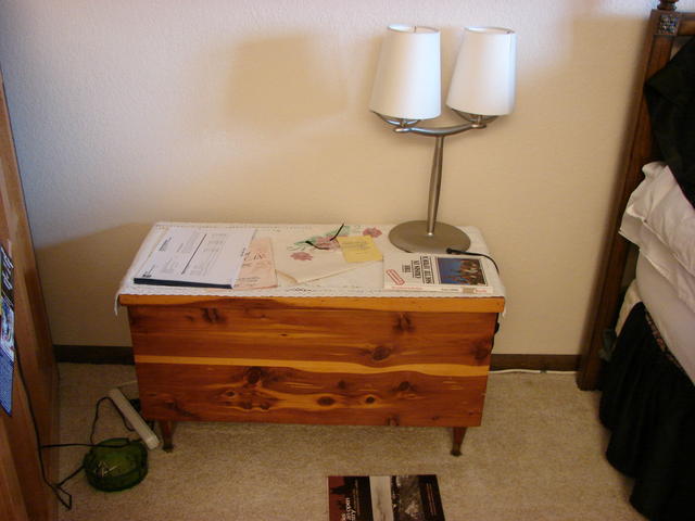 Dale made me the hope chest in his shop class.  The lamp is from my mom's house, but not memorable for me.  I think my mom made