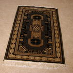 I bought this rug in Morocco.  I think it cost around $150.