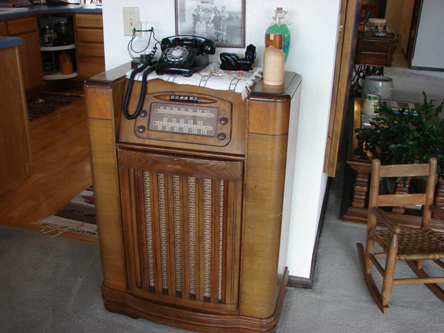 LW's radio, my phone that I got from school when some kids threw it away after their dramas, chac mool from Mexico, doily from E