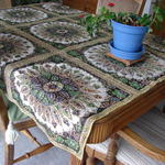Table cloth from Morocco, cost around $150.  Table bought in Michigan and I refinished it.  Larry Lynam made the leaf for it.