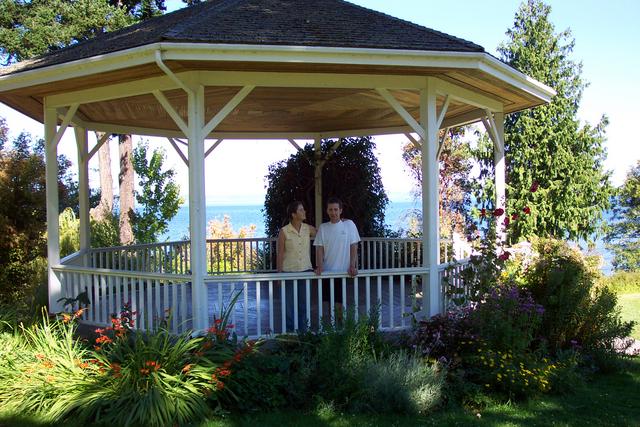 They'll stand here in the gazebo with Puget Sound in the background.