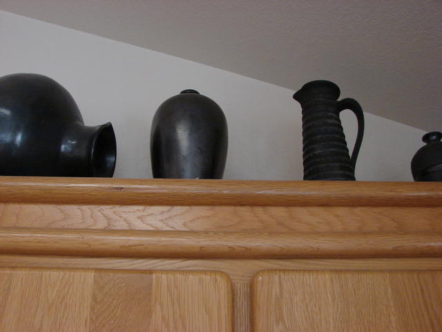 Black pottery from Oaxaca.  Tall black pitcher may have different origin.