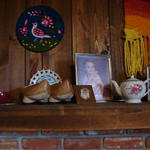 Wooden shoes from Spain, picture of Lindsay in dress I crocheted for her, Chris made the yarn wall hanging, I bought the teapot.