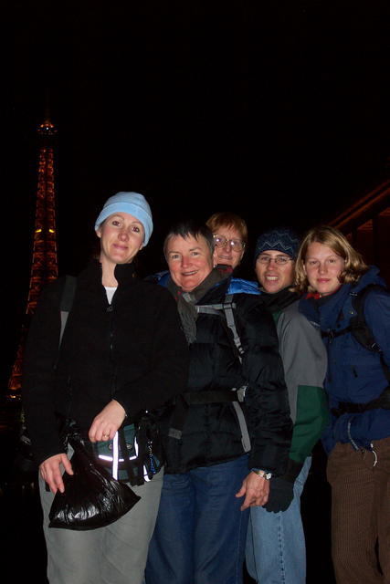 Can you believe we're all standing in front of the Eiffel Tower in Paris?