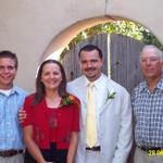 Brad with his brother Scott, his mother Donna and her husband Ron