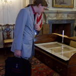 Chris looking at a copy of the treaty ending the Spanish-American war.