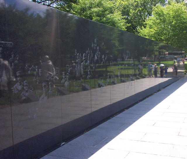 This wall had drawings that appeared to be shadows and is part of the Korean War Memorial.