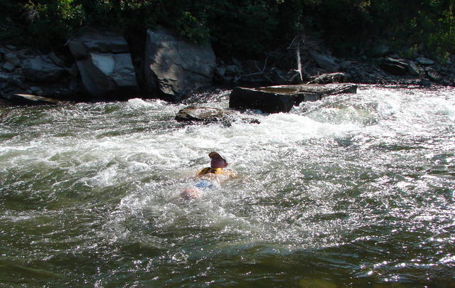 We each jumped in next to the hole and floated downstream.