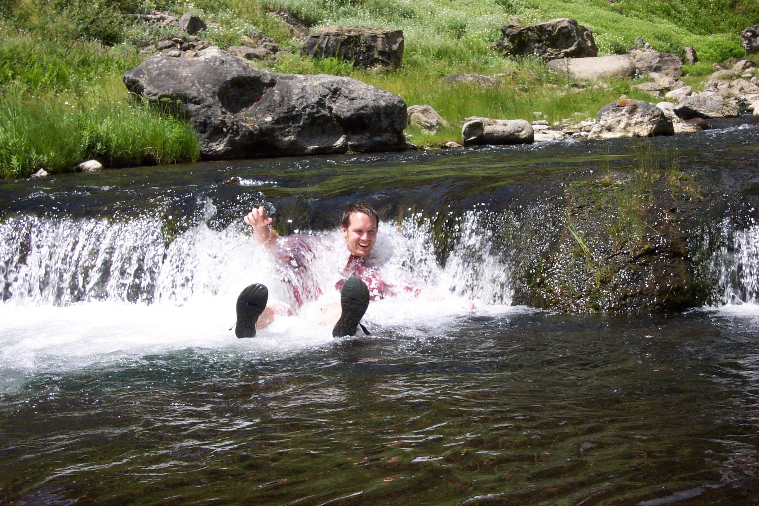 Morgan tries out one of the little water falls.  What a great massage!