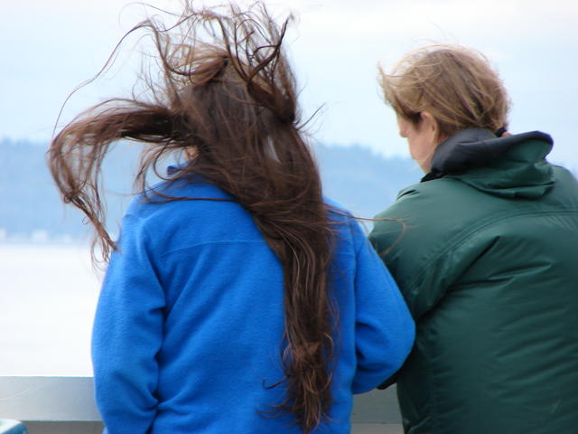 Chris and Carrie wanted to ride in the bow, even though it was windy.