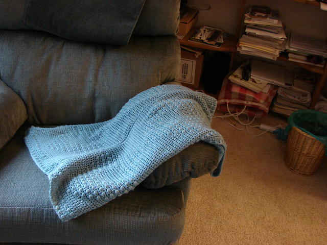 Lindsay made the throw for me.  It was actually supposed to be a rug, but it's a super soft, very warm throw.  A white one that