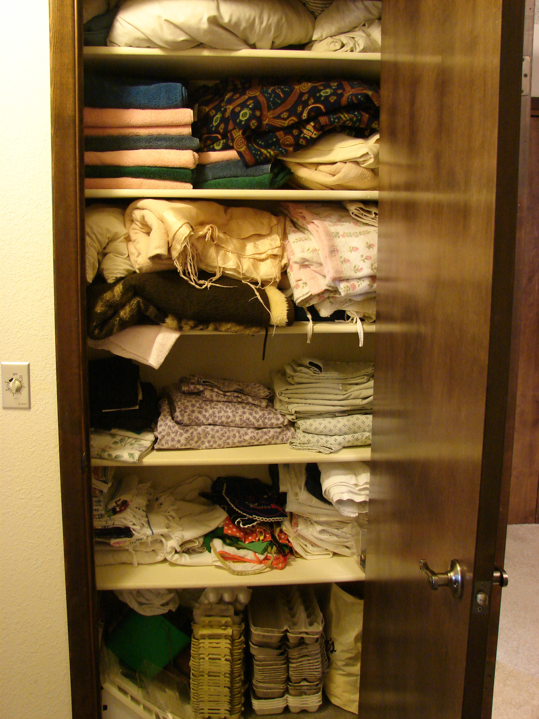 Linen closet.  lots of sheets, blankets, towels and 2 nice table cloths-One from Mexico and one from Uncle Louis.