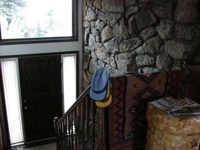 Rock fireplace wall.