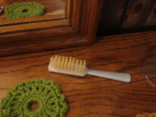 This may have been Scott or Dale's hairbrush.  It came from Mom's house.