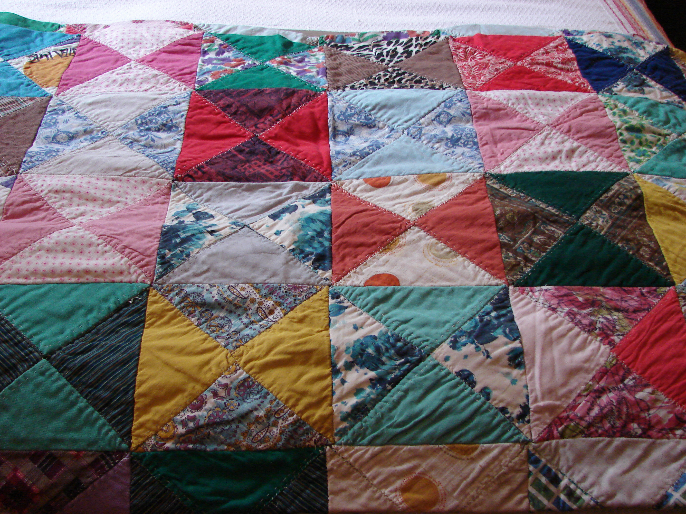 Mom also made this quilt.  I have two more of her quilts in my closet.