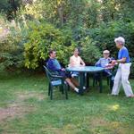 Judy brings out food!  What a lovely place for dinner.