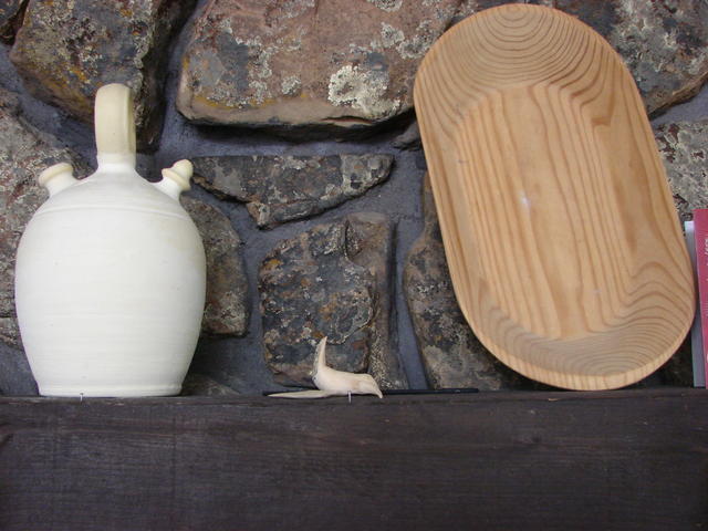 Pitcher is worker's water pitcher from Spain, little bird is made by carver while I watched in Mexico, bowl is from Mexico.