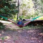 Ben decided to relax on the hammock.