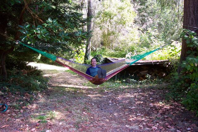 Ben decided to relax on the hammock.