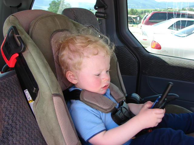 Matteo was hot and tired, but he was happy because he had control of the walkie talkie.