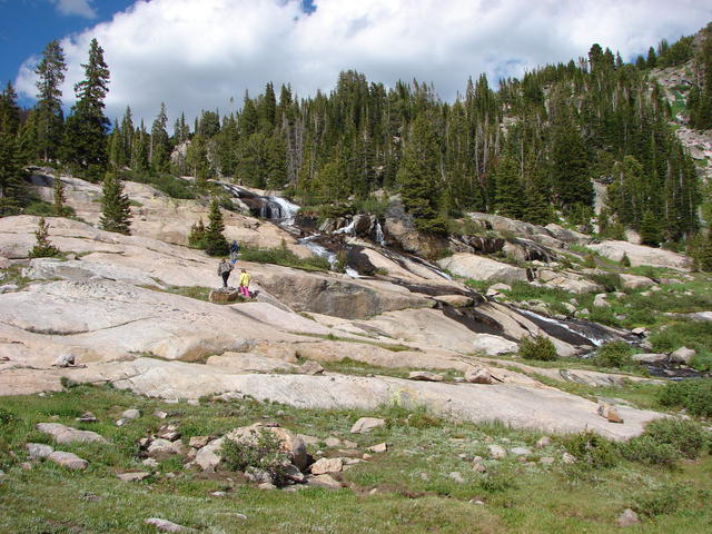 We hiked up the hill to the waterfall by our camp.