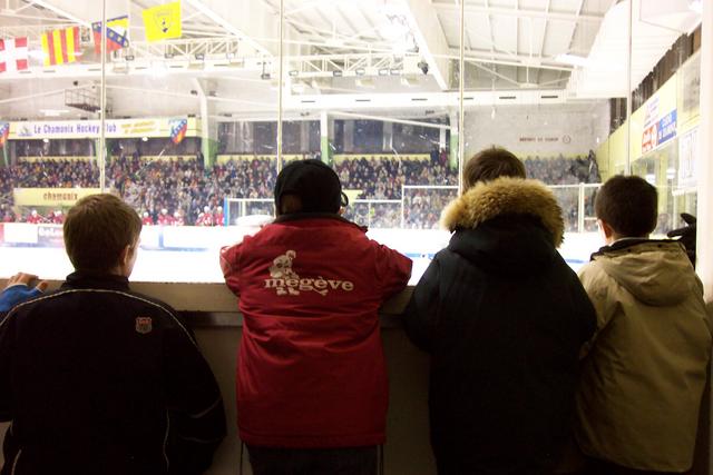 Linda and I had front-row seats.  These boys in front of us had an even better view.  Did someone score?