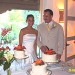 Brad and Christina prepare to cut the cake.