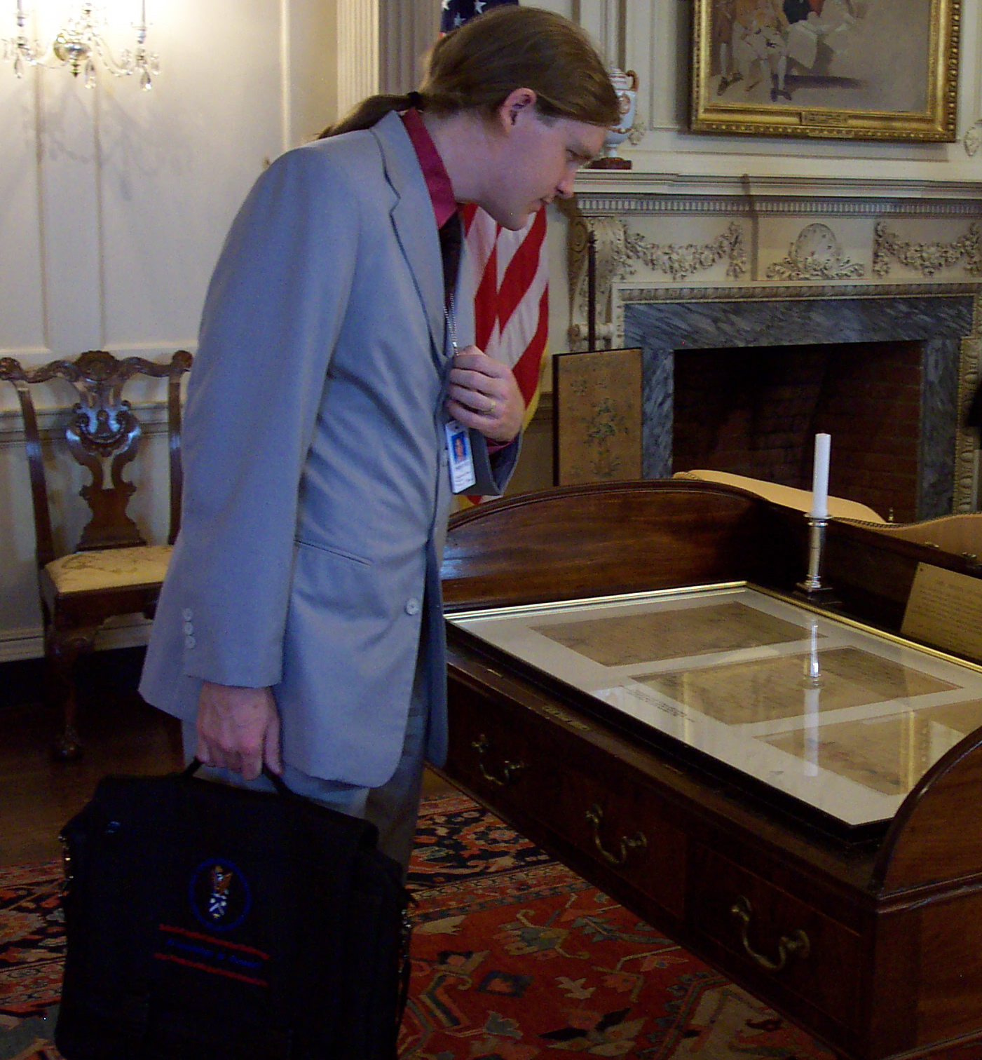 Chris looking at a copy of the treaty ending the Spanish-American war.