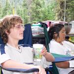 Jackie and Ben rest during meal preparation.