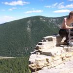 Ben climbed out onto the big rocks.