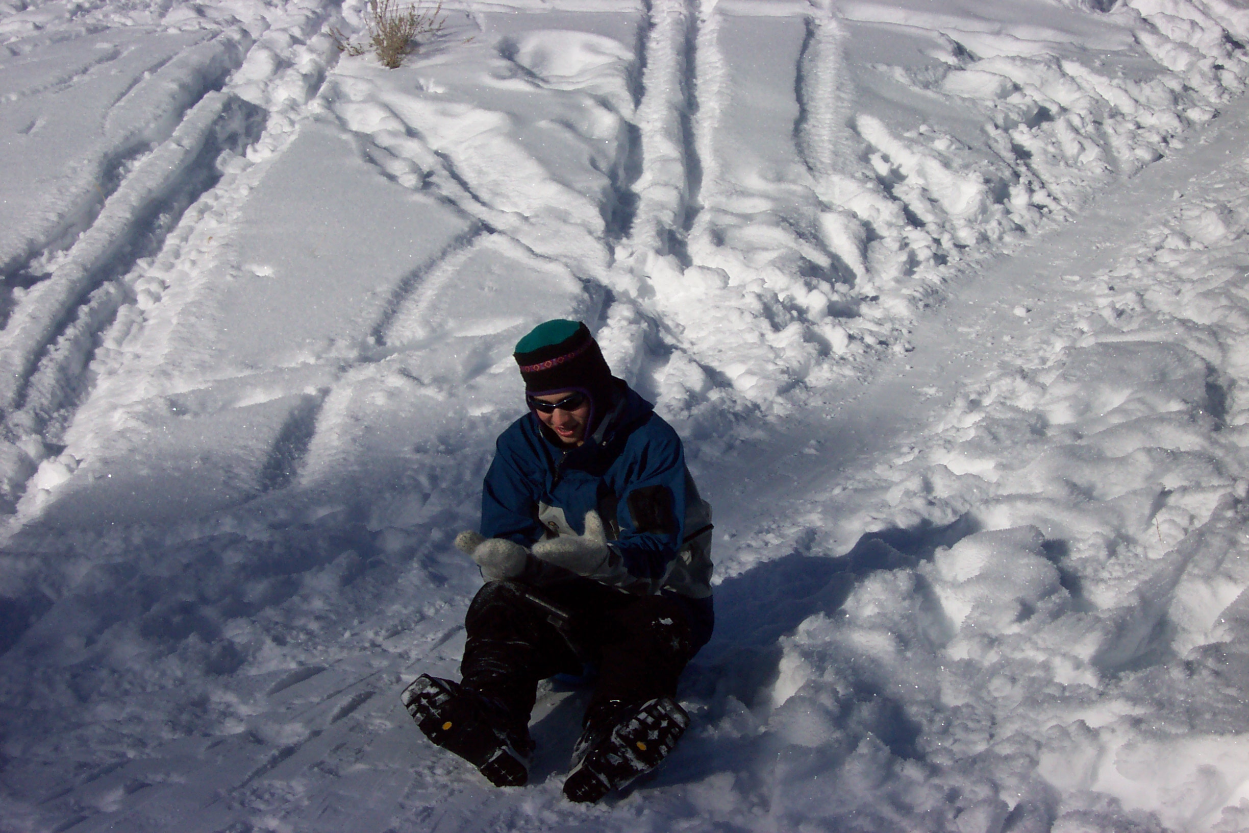 Jeremy can have fun anywhere with anything.  Here, he's abandoned his high-tech telemark gear in favor of a shovel.